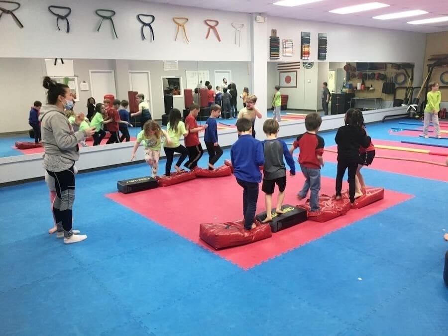 Children&rsquo;s martial arts program building coordination through agility drills